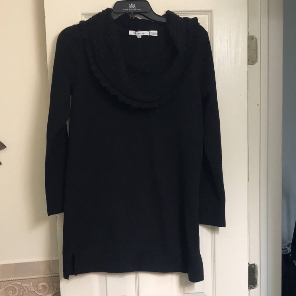 Black cowl neck sweater.